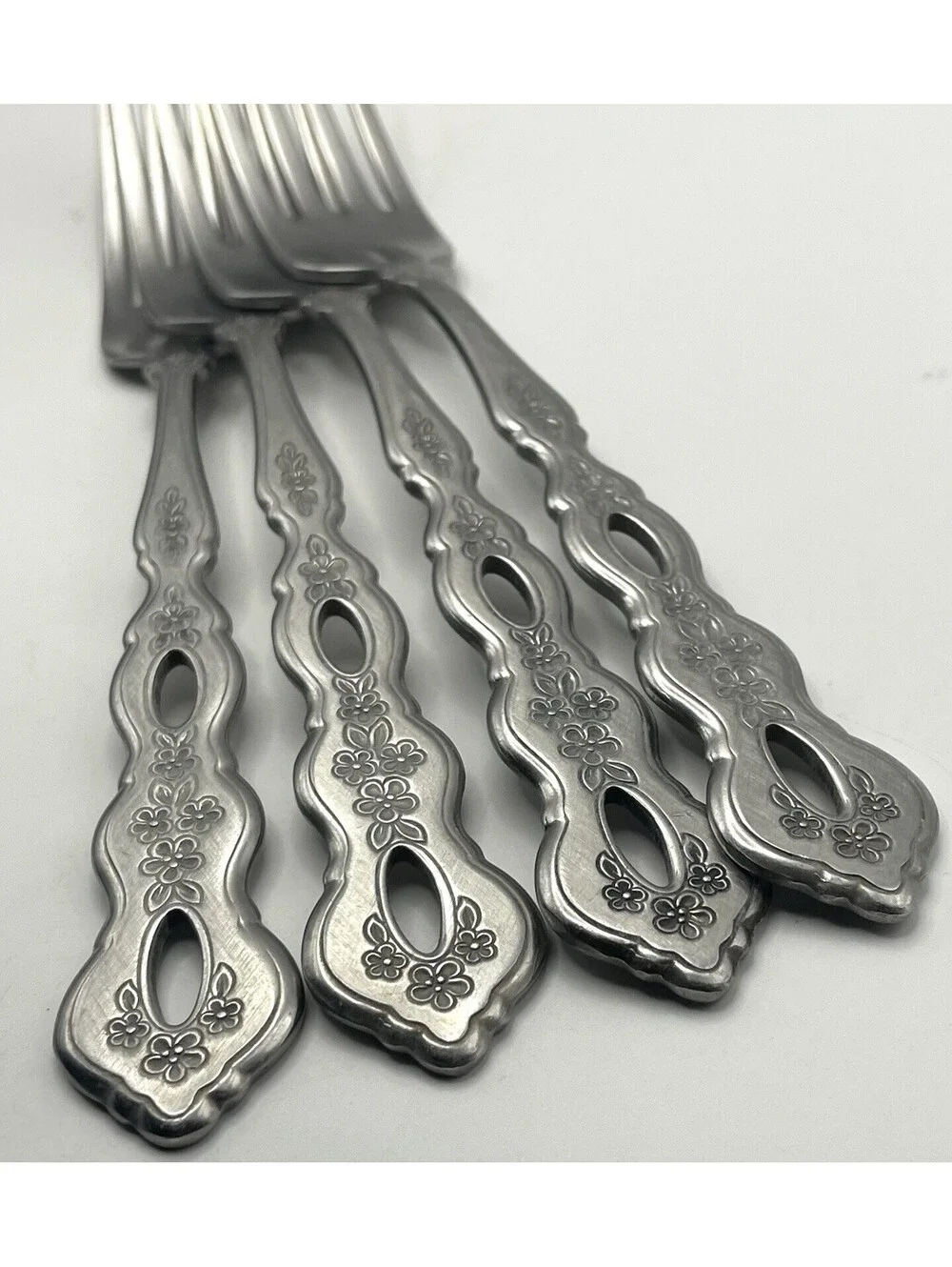 4- Oneida Community FANTASY Burnished Stainless Pierced Hndl Dinner Fork ~7.25”